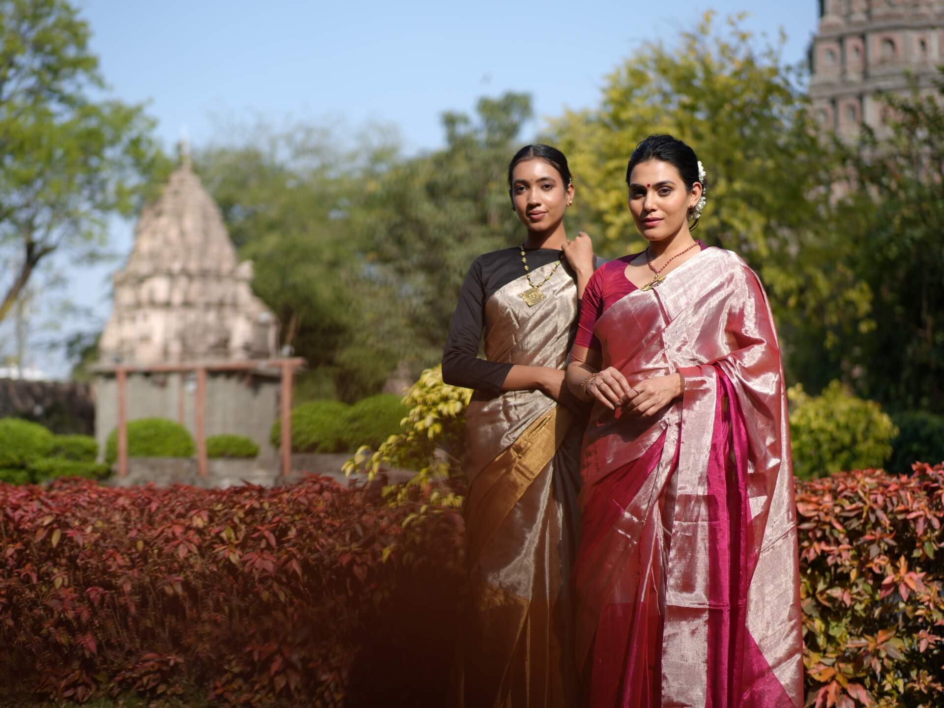 Women wearing elegant Chanderi sarees in traditional setting